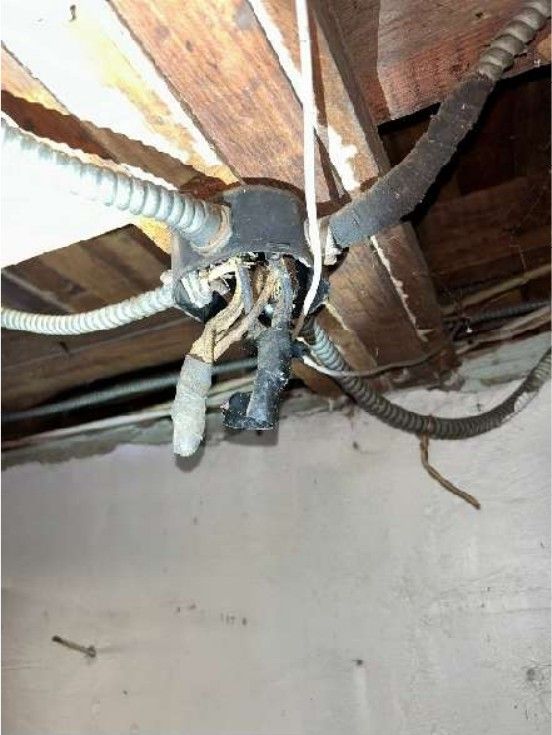 Open junction box on old knob-and-tube wiring in a Willow Grove, PA basement