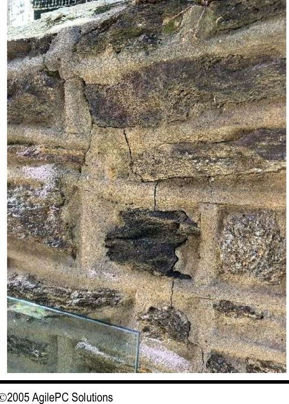 Crack running through a stone foundation wall in a Logan, Philadelphia, PA basement documented during a home inspection
