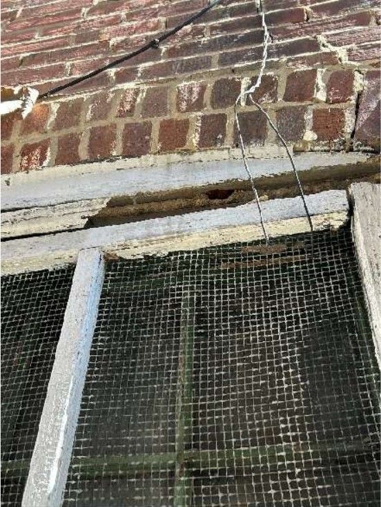 Frayed electrical service entrance cable at a Logan, Philadelphia, PA home documented during a home inspection, showing worn and exposed conductors