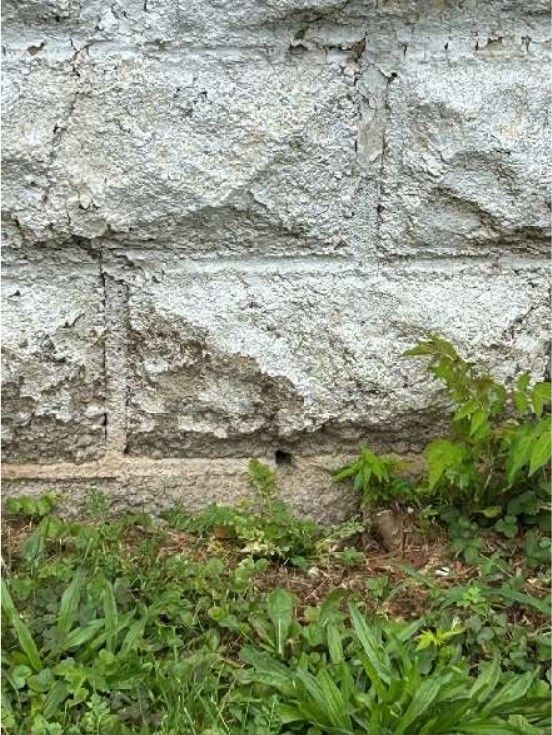 Stucco applied directly over a block foundation wall on a Willow Grove, PA home during a home inspection