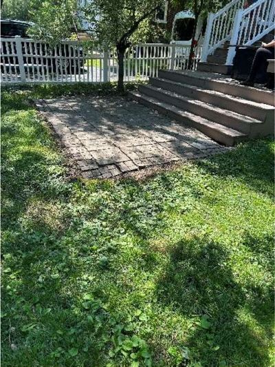 Exterior basement walkout steps with no handrail at a Roxborough Philadelphia home, documented during a June 2026 home inspection