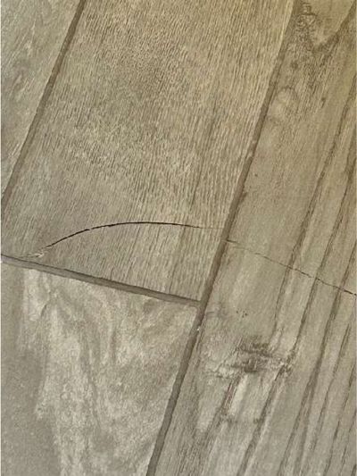 Fireplace firebox with open and deteriorated brick joints and cobwebs in a 1946 Yardley PA home, found during a June 2026 home inspection