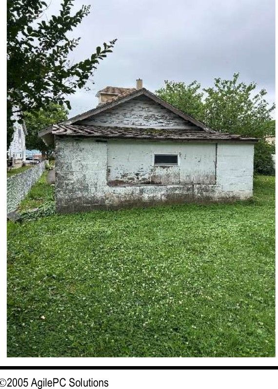 A deteriorated detached garage on a Willow Grove, PA property, photographed during a home inspection