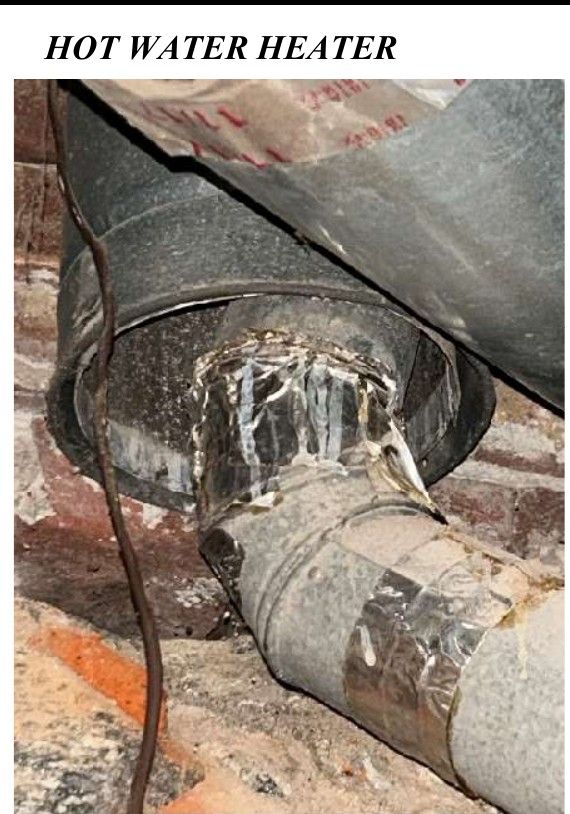 A corroded water heater flue vent in a Northeast Philadelphia, PA basement