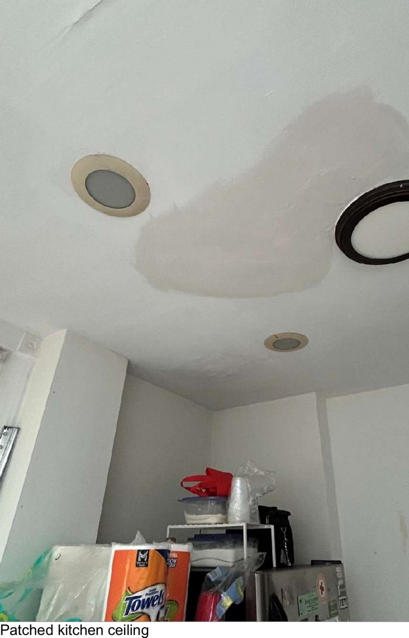 Patched and repainted kitchen ceiling over a previously reported leak in a Manayunk, PA property