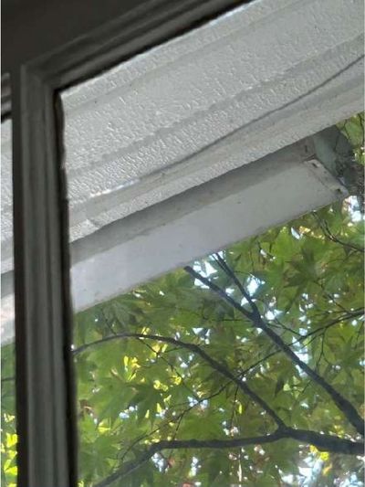 Blown thermal-pane window with a failed seal between the glass in a Roxborough Philadelphia home, documented during a June 2026 home inspection