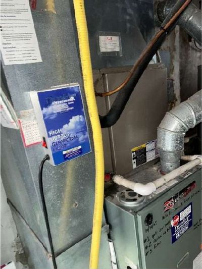 Basement furnace and heating ducts with older wrap consistent with asbestos-type insulation in a pre-war Willow Grove PA home, documented during a July 2026 home inspection