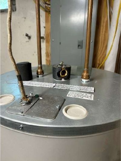Water heater temperature and pressure relief valve missing its discharge extension tube in a Roxborough Philadelphia basement, found during a June 2026 home inspection