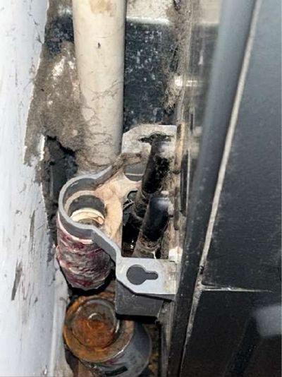 Corroded and dirty water supply valve and piping in the basement of a Fishtown mixed-use rowhome, documented during a May 2026 home inspection