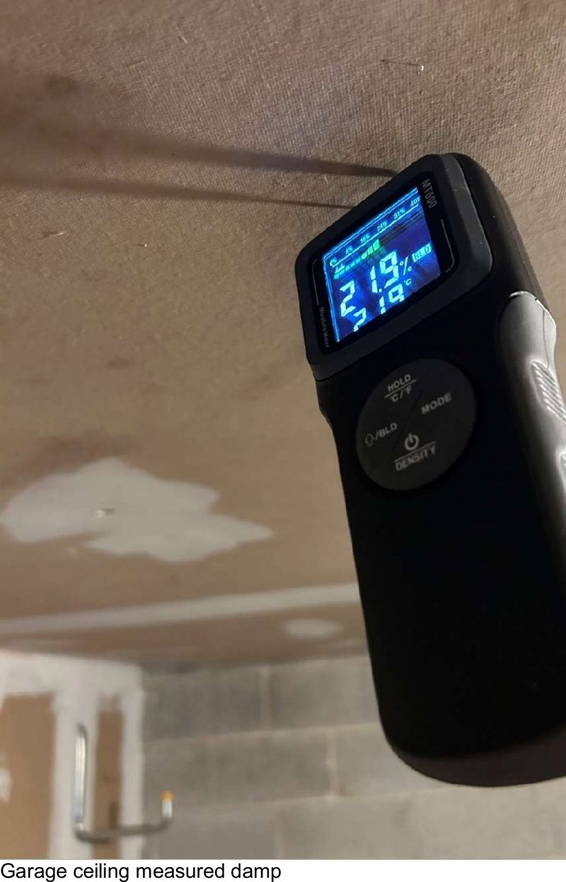 A damp garage ceiling on a West Chester, PA home, photographed during a home inspection