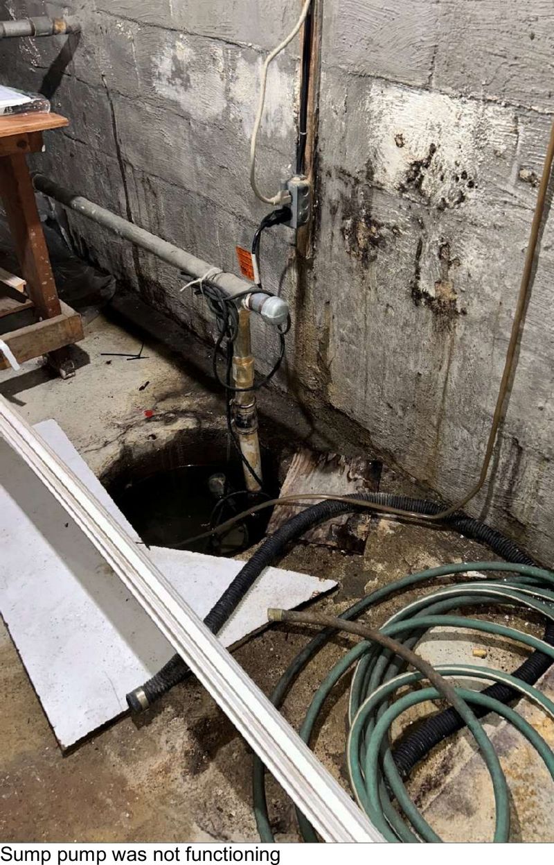 A sump pit whose pump was not functioning in a Haddon Township, NJ basement during mold testing