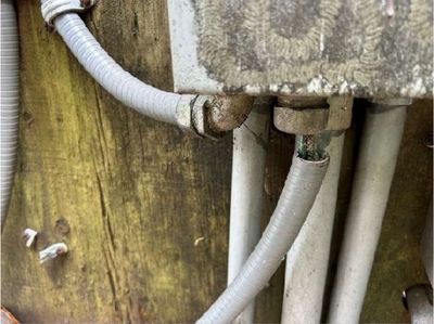 Disconnected ground wire at a corroded pool motor junction on a Schwenksville PA in-ground pool, found during a June 2026 home inspection
